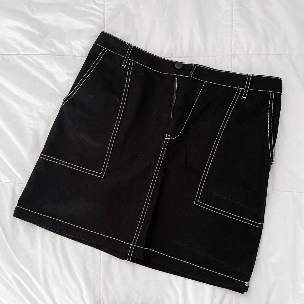 Black denim skirt with white stitching